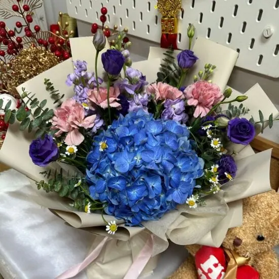 Home 29 Hannah ( My Sweetheart ); blue hydrangea, caramel carnations, daisies, lilac matthiola, purple eustoma